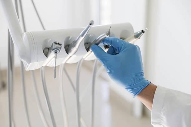 Professional Tooth Extraction technician working in Polk County County, AR